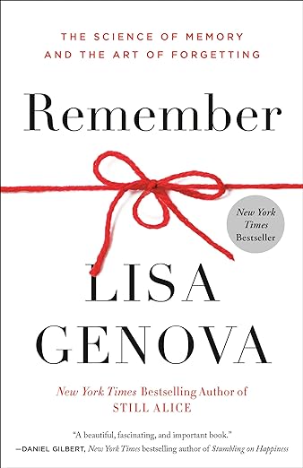 White book cover with red ribbon of Remember