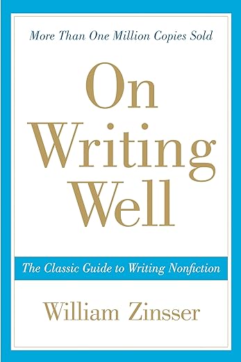 White book cover with blue margin and gold letters