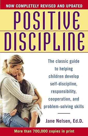 Yellow book cover of Positive Discipline