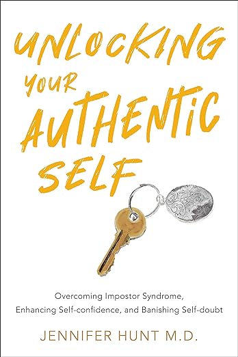 White book cover with a key and yellow letters spelled Unlocking your Authentic Self
